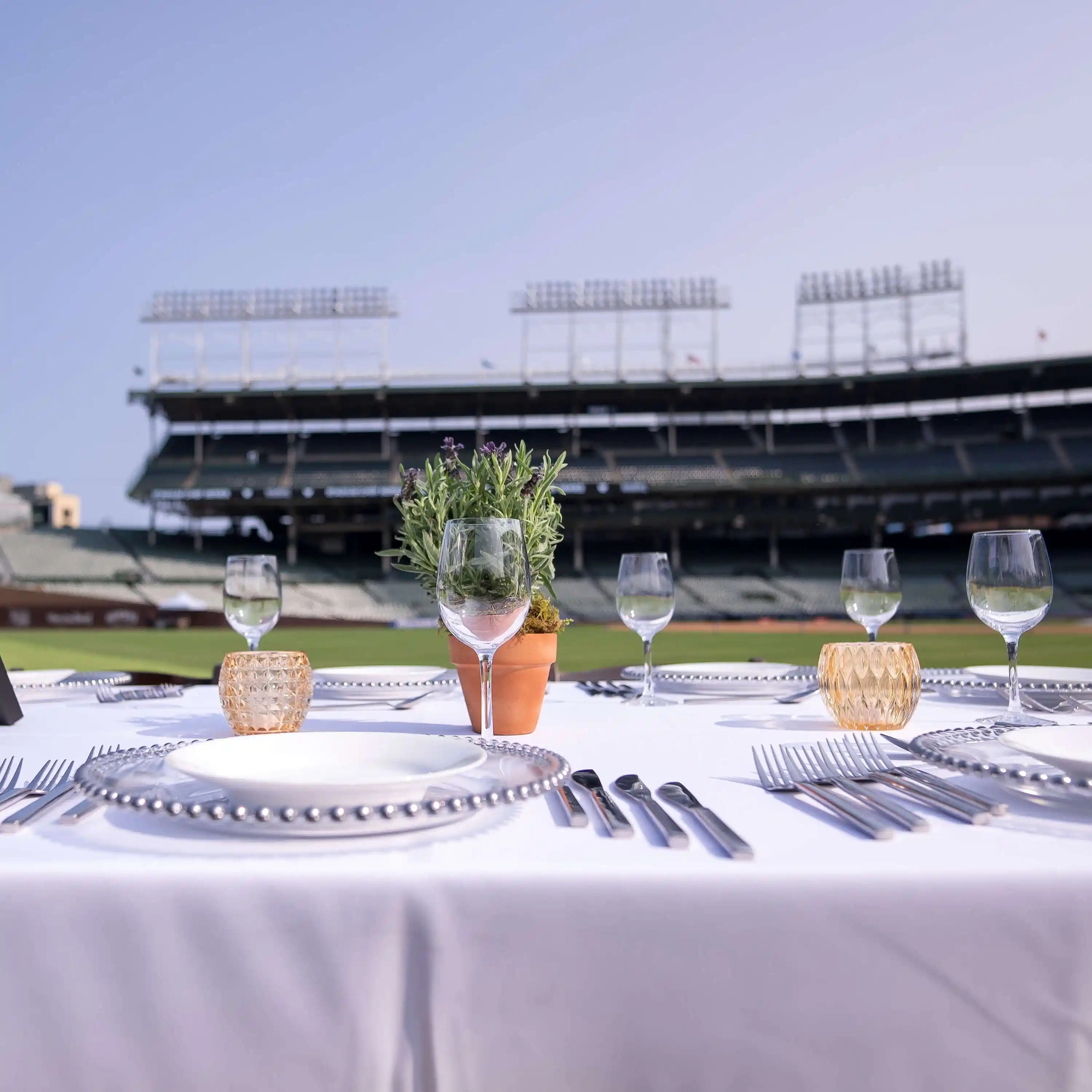 A long banquet table set up on Wrigley Field - Mobile Version