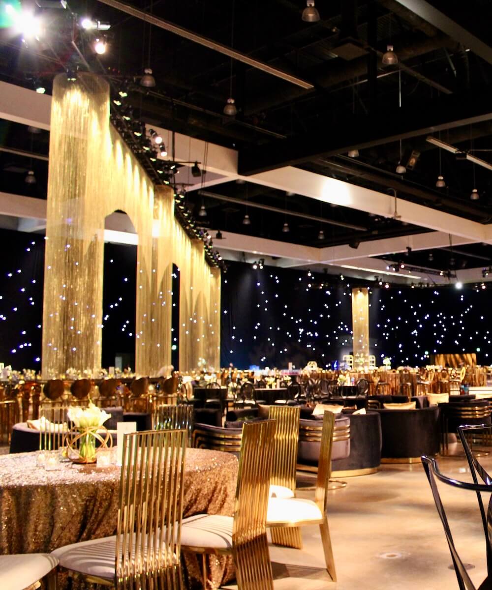 wide shot of award show room and tables at emmy's