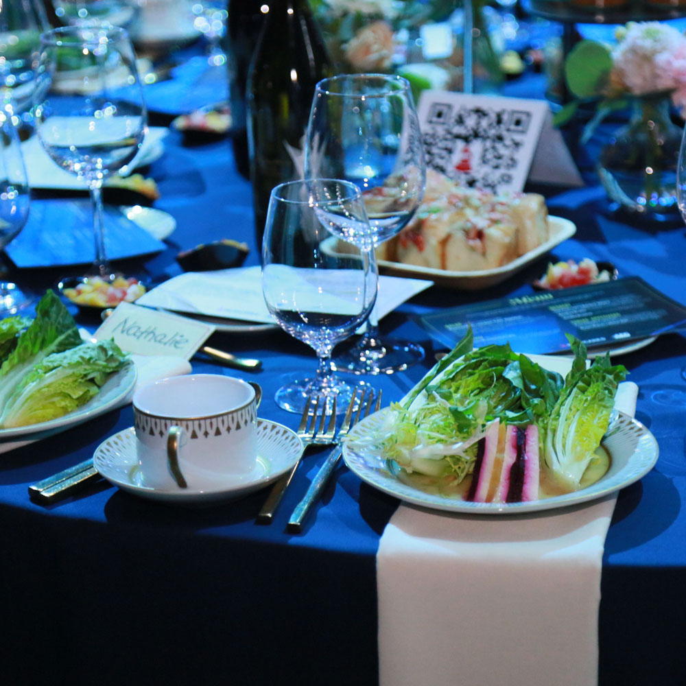 convention center table dressing with salads plated