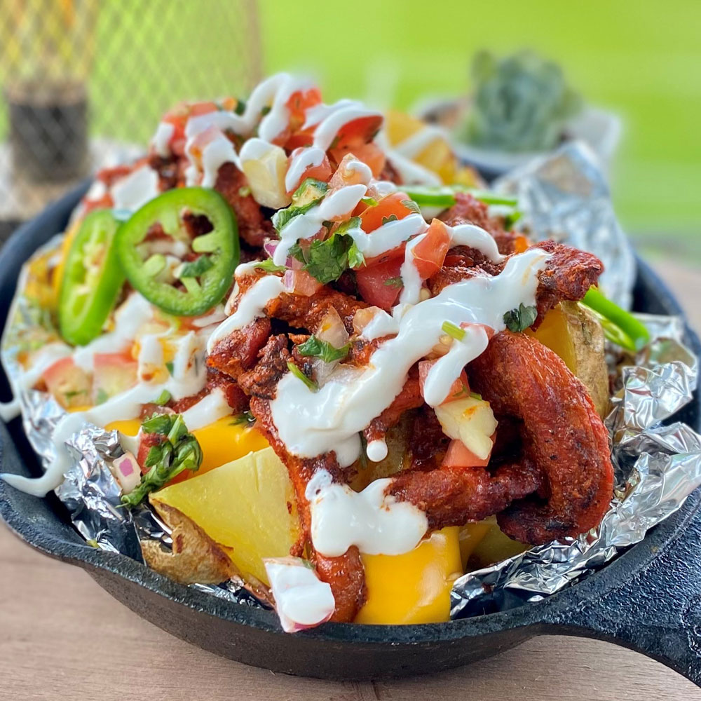 loaded nacho dish at an MLS soccer game