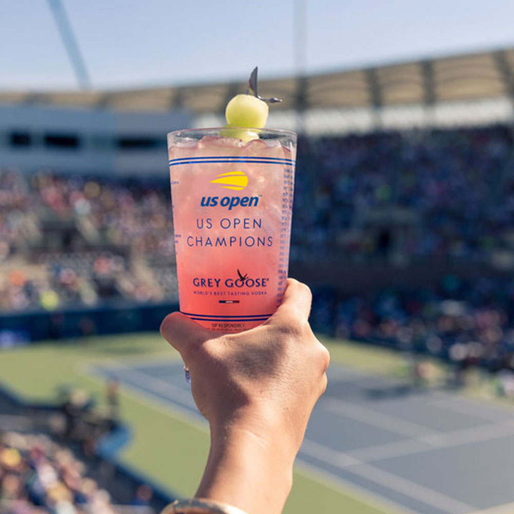 honey deuce with a tennis stadium in the background