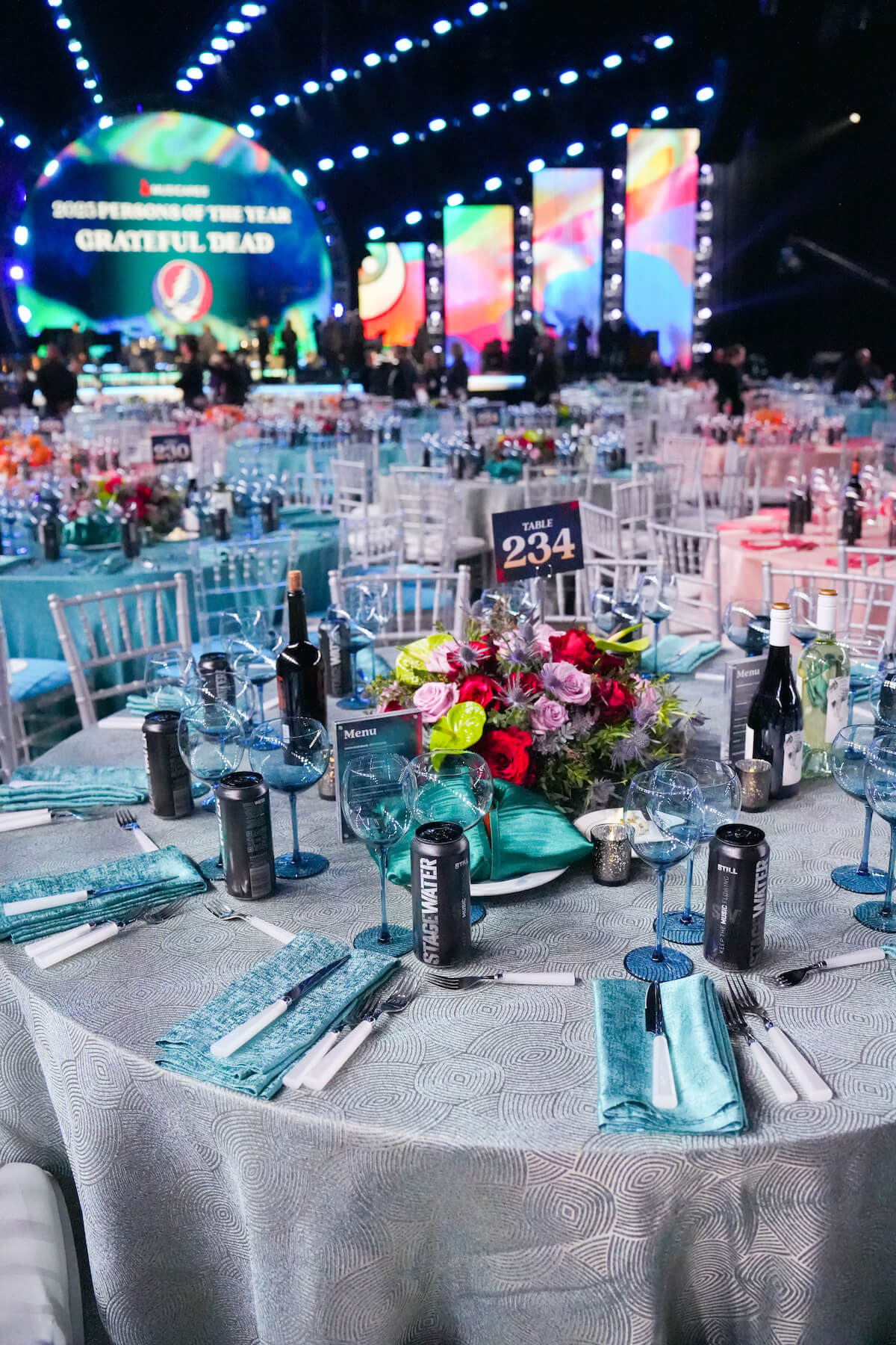 Blue table setting with Grateful Dead in background