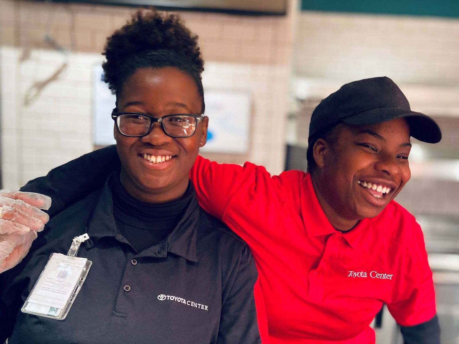 two levy team members laughing