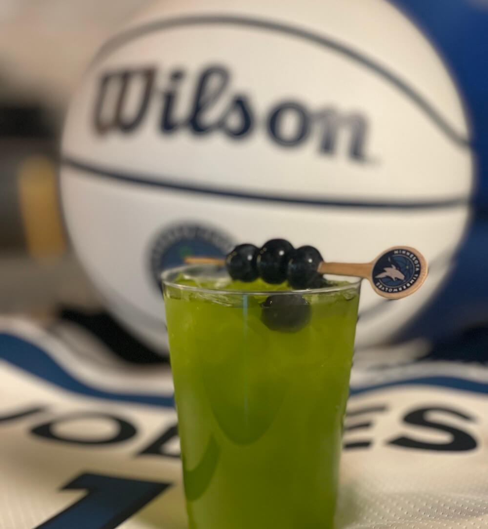 wilson basketball behind green cocktail