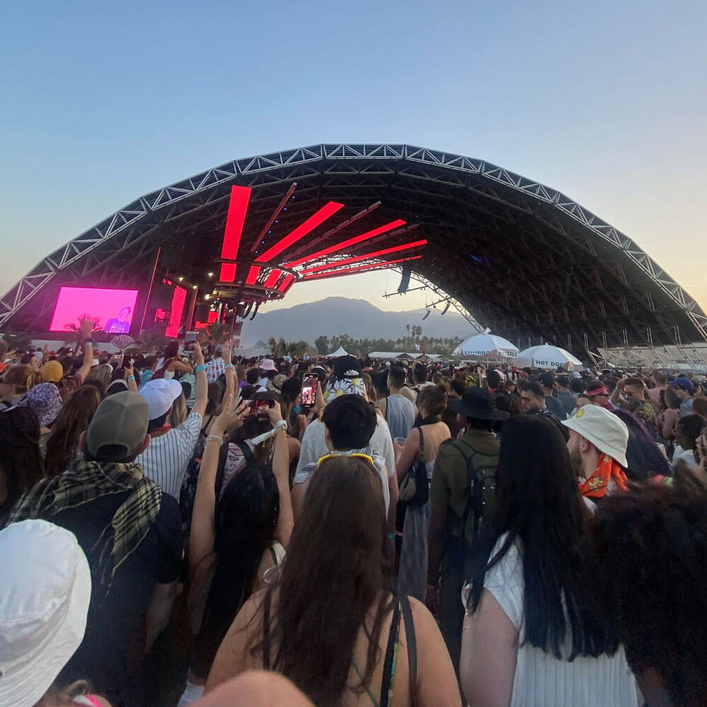 a crowd at a music festival